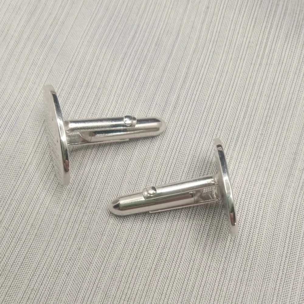 Silver Toned Oval Cufflinks By Swank
